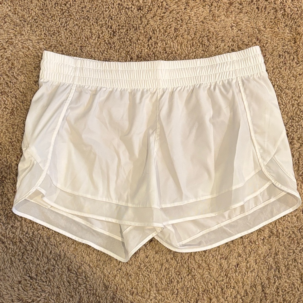 White Athleta mesh racer Shorts 4in
